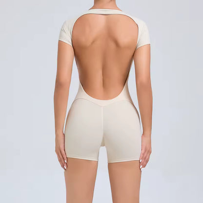 Macacão feminino de manga curta — peça única com secagem rápida, ideal para ioga, treino e ginásio; modelo justo tipo bodysuit com calções desportivos.