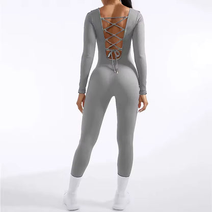 Novo macacão feminino de uma peça com manga comprida — body de bandagem desportiva, ideal para ginásio, ciclismo e treino, com design que modela o corpo.