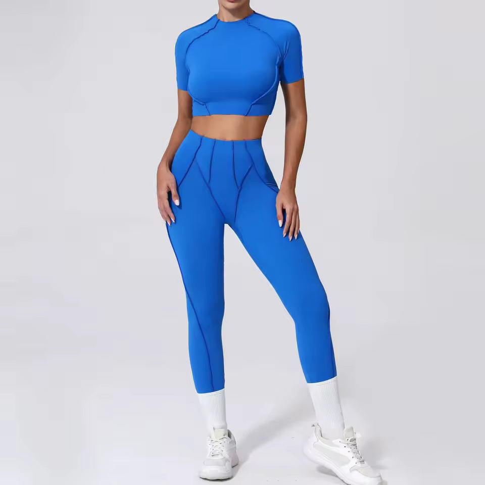 Conjunto de fitness feminino — agasalho de ioga com top de manga curta e leggings de cintura subida, ideal para treino e ginásio.