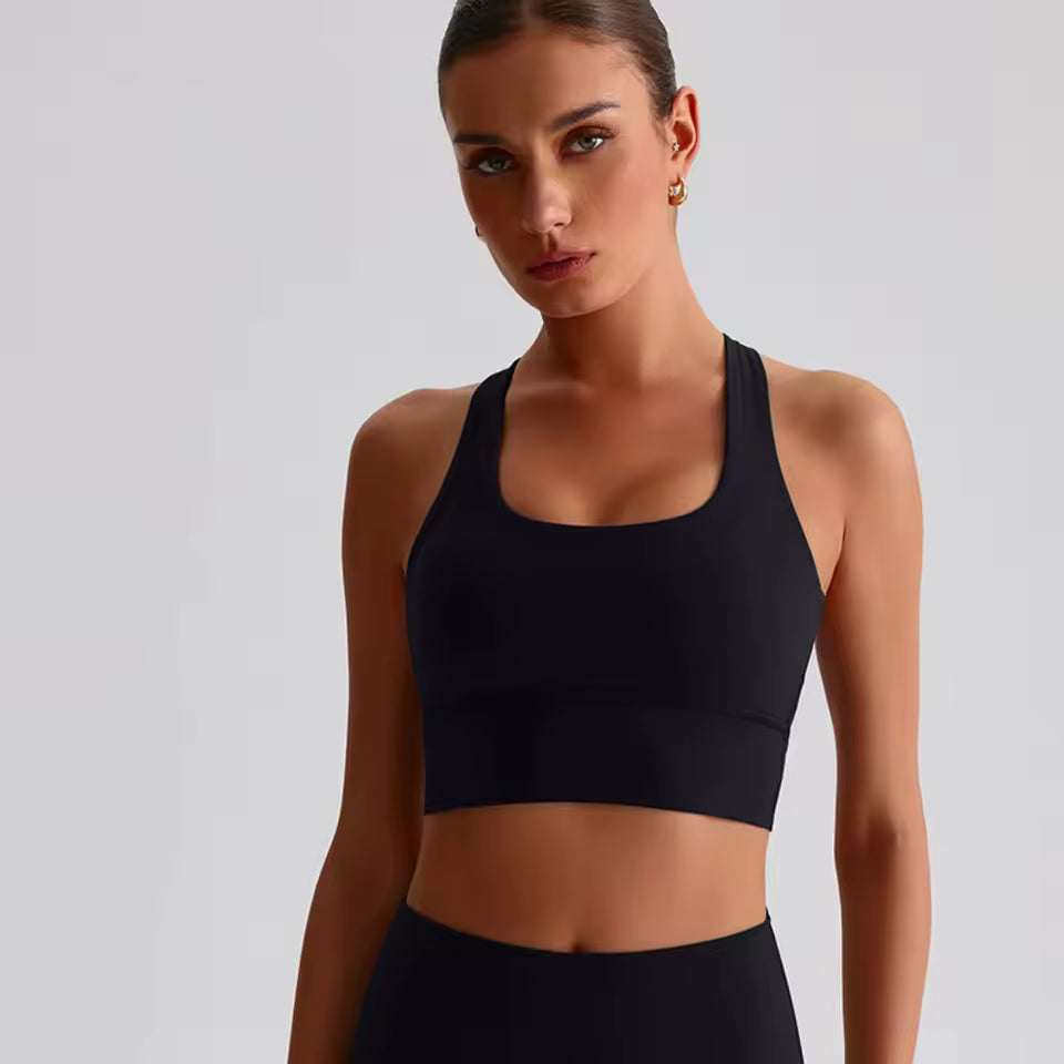 Conjunto feminino de leggings e sutiã de fitness em cor sólida — tecido macio, ajustado e resistente, ideal para treino de alta intensidade e à prova de agachamentos.