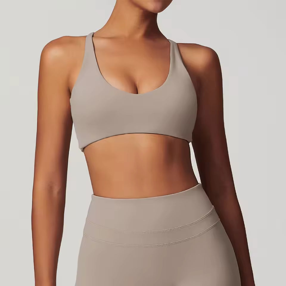 Top desportivo feminino push-up — ideal para ginásio, corrida e yoga, com tecido elástico e confortável