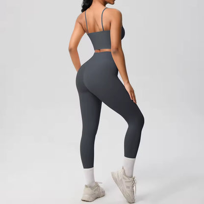 Conjunto desportivo feminino 2 peças — roupa de treino e ioga, com sutiã de suporte e leggings modeladoras para controlo abdominal.