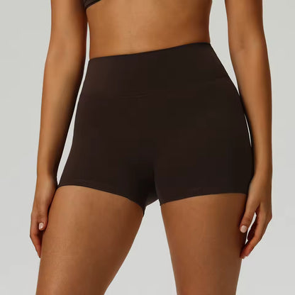 Shorts desportivos femininos de cintura alta, cor sólida, macios, respiráveis e de secagem rápida, ideais para treino, ciclismo, yoga e ginásio