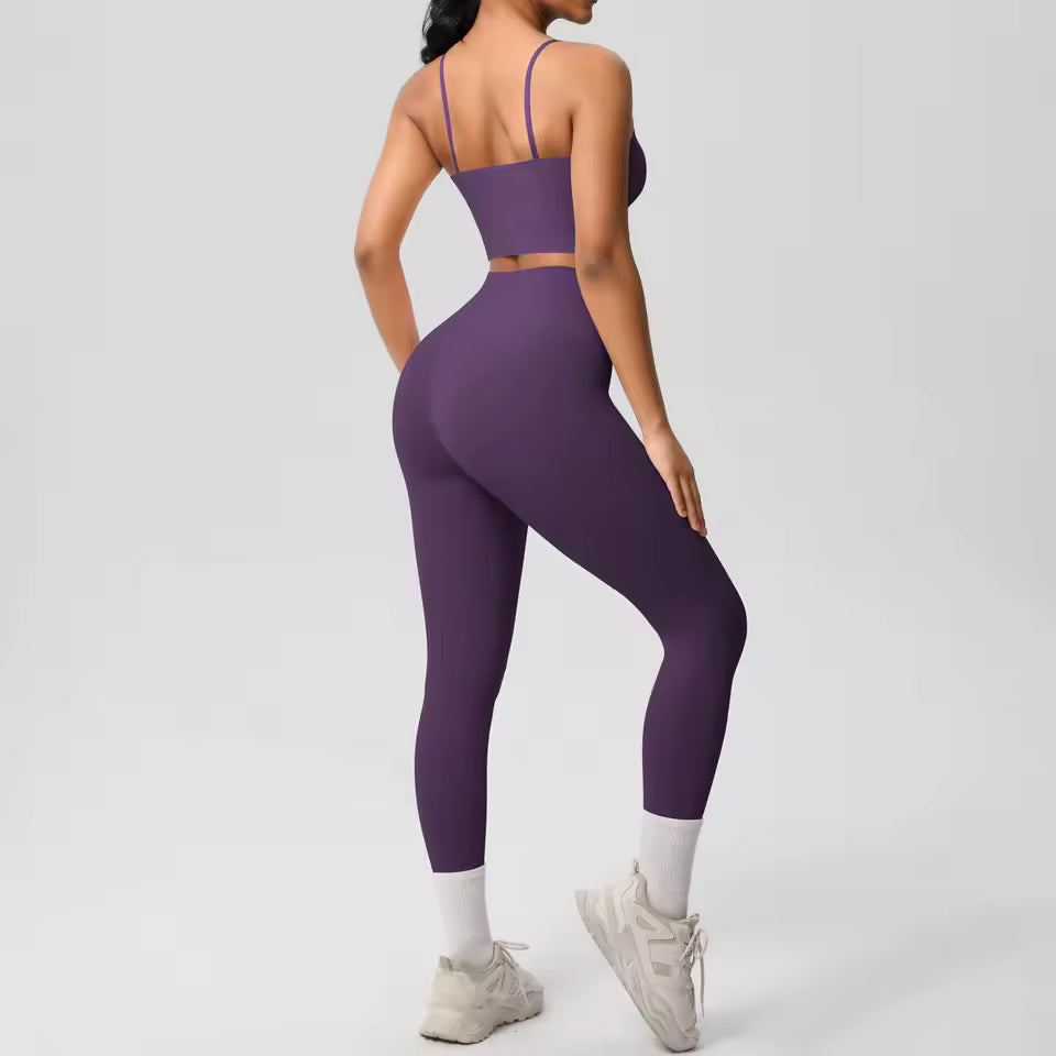 Conjunto desportivo feminino 2 peças — roupa de treino e ioga, com sutiã de suporte e leggings modeladoras para controlo abdominal.