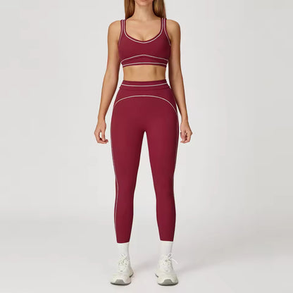 Conjunto de yoga feminino de 2 peças com contraste de cores, composto por sutiã desportivo e leggings de cintura alta, ideal para treino, corrida e fitness.