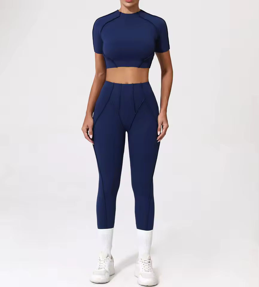 Conjunto de fitness feminino — agasalho de ioga com top de manga curta e leggings de cintura subida, ideal para treino e ginásio.