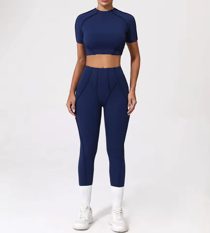 Conjunto de fitness feminino — agasalho de ioga com top de manga curta e leggings de cintura subida, ideal para treino e ginásio.