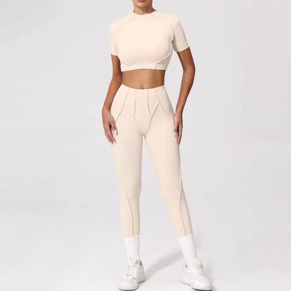 Conjunto de fitness feminino — agasalho de ioga com top de manga curta e leggings de cintura subida, ideal para treino e ginásio.