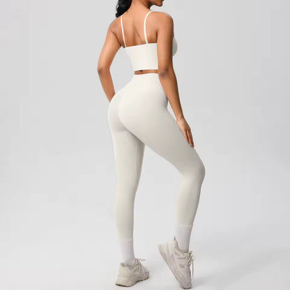 Conjunto desportivo feminino 2 peças — roupa de treino e ioga, com sutiã de suporte e leggings modeladoras para controlo abdominal.