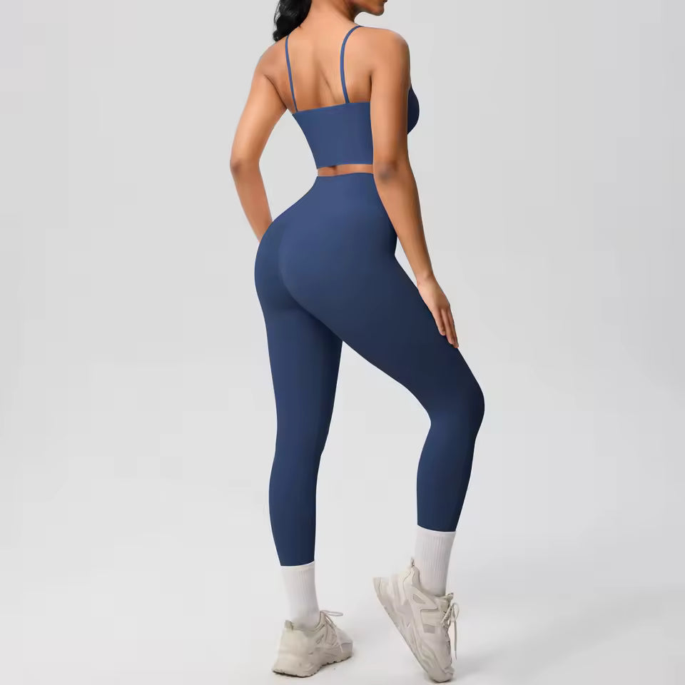 Conjunto desportivo feminino 2 peças — roupa de treino e ioga, com sutiã de suporte e leggings modeladoras para controlo abdominal.