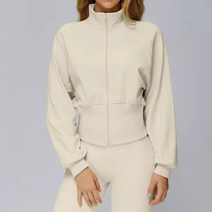 Casaco desportivo feminino de inverno para yoga, com mangas compridas, gola alta, zíper, resistente ao vento e quente — moletom solto ideal para atividades ao ar livre e corrida.