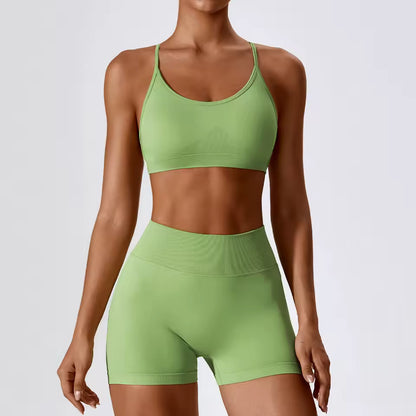 Conjunto feminino sem costuras para ioga e ginásio — inclui top curto e calções, ideal para treino, corrida e fitness (2 peças).