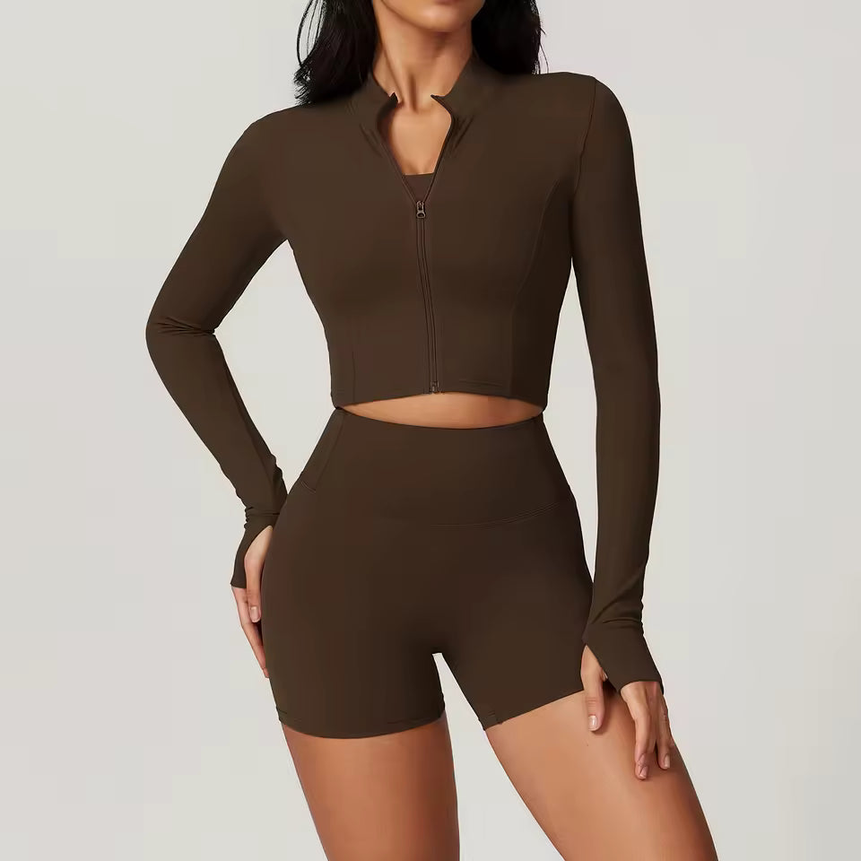 Casaco desportivo feminino de manga comprida, com fecho de zíper, gola alta e tecido de secagem rápida — ideal para yoga, corrida e atividades de fitness ao ar livre.