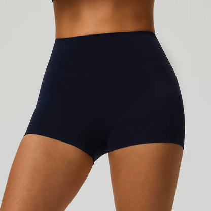 Shorts desportivos femininos de cintura alta, cor sólida, macios, respiráveis e de secagem rápida, ideais para treino, ciclismo, yoga e ginásio