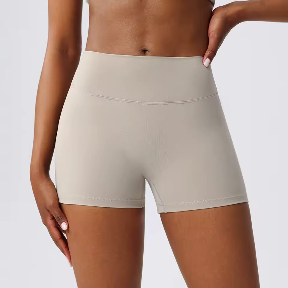 Shorts desportivos femininos de cintura alta, cor sólida, macios, respiráveis e de secagem rápida, ideais para treino, ciclismo, yoga e ginásio