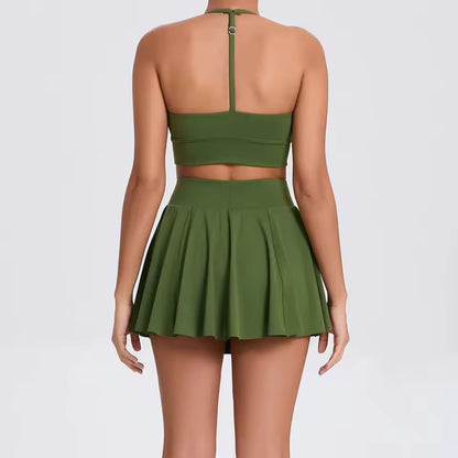 Conjunto feminino de yoga e desporto ao ar livre, de 2 peças, composto por sutiã desportivo e saia curta, ideal para treino, corrida e atividades casuais, com tecido respirável e confortável.