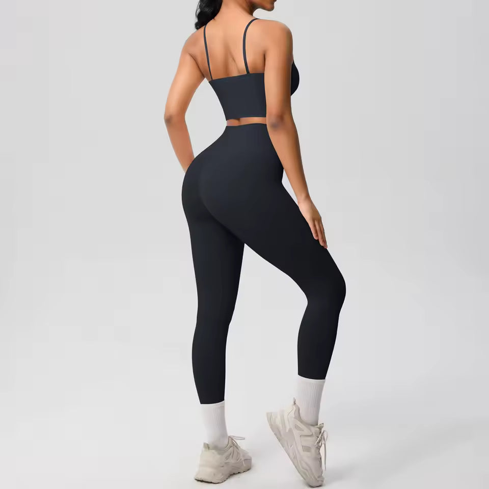 Conjunto desportivo feminino 2 peças — roupa de treino e ioga, com sutiã de suporte e leggings modeladoras para controlo abdominal.