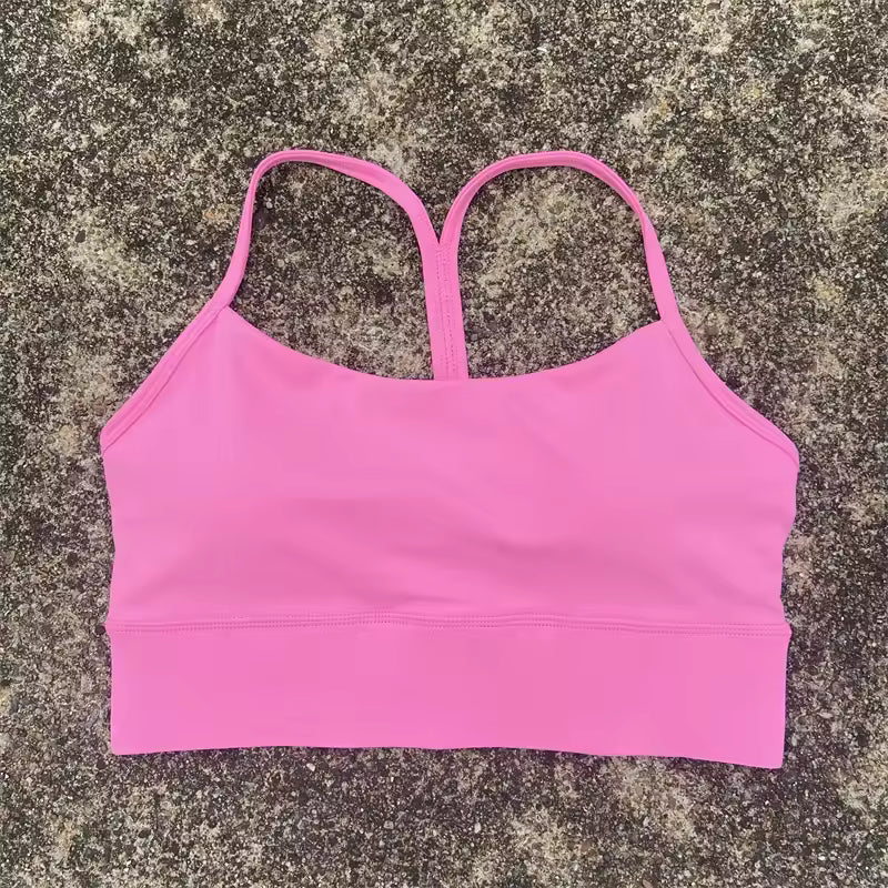 Top desportivo feminino de cor sólida, com formato em Y, macio e ajustado, ideal para treino completo, corrida, ginásio ou ioga, com almofadas removíveis no peito.