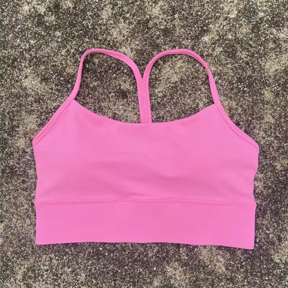 Top desportivo feminino de cor sólida, com formato em Y, macio e ajustado, ideal para treino completo, corrida, ginásio ou ioga, com almofadas removíveis no peito.