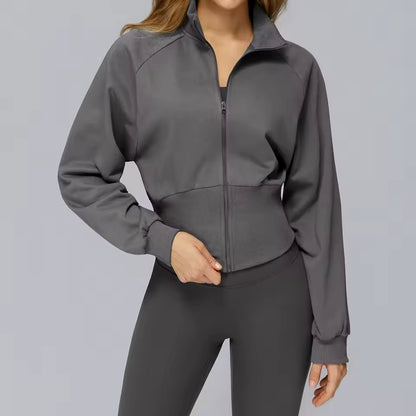 Casaco desportivo feminino de inverno para yoga, com mangas compridas, gola alta, zíper, resistente ao vento e quente — moletom solto ideal para atividades ao ar livre e corrida.