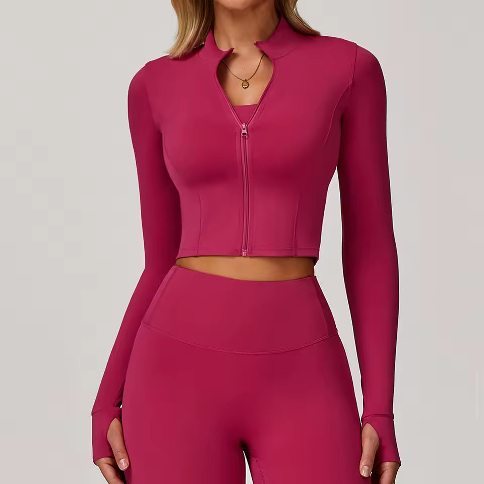 Casaco desportivo feminino de manga comprida, com fecho de zíper, gola alta e tecido de secagem rápida — ideal para yoga, corrida e atividades de fitness ao ar livre.
