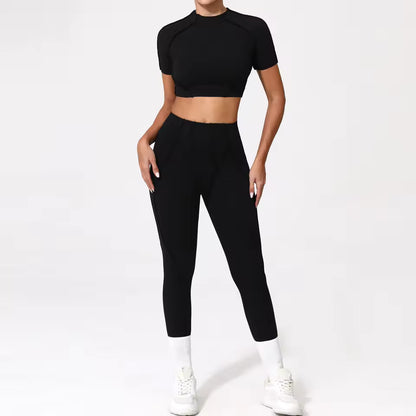 Conjunto de fitness feminino — agasalho de ioga com top de manga curta e leggings de cintura subida, ideal para treino e ginásio.