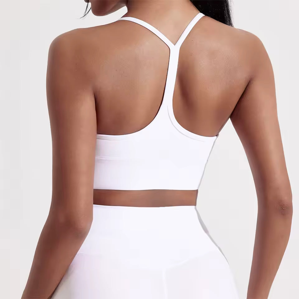 Top desportivo feminino de cor sólida, com formato em Y, macio e ajustado, ideal para treino completo, corrida, ginásio ou ioga, com almofadas removíveis no peito.