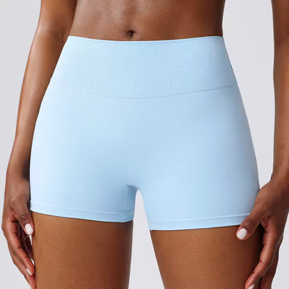 Shorts desportivos femininos de cintura alta, cor sólida, macios, respiráveis e de secagem rápida, ideais para treino, ciclismo, yoga e ginásio