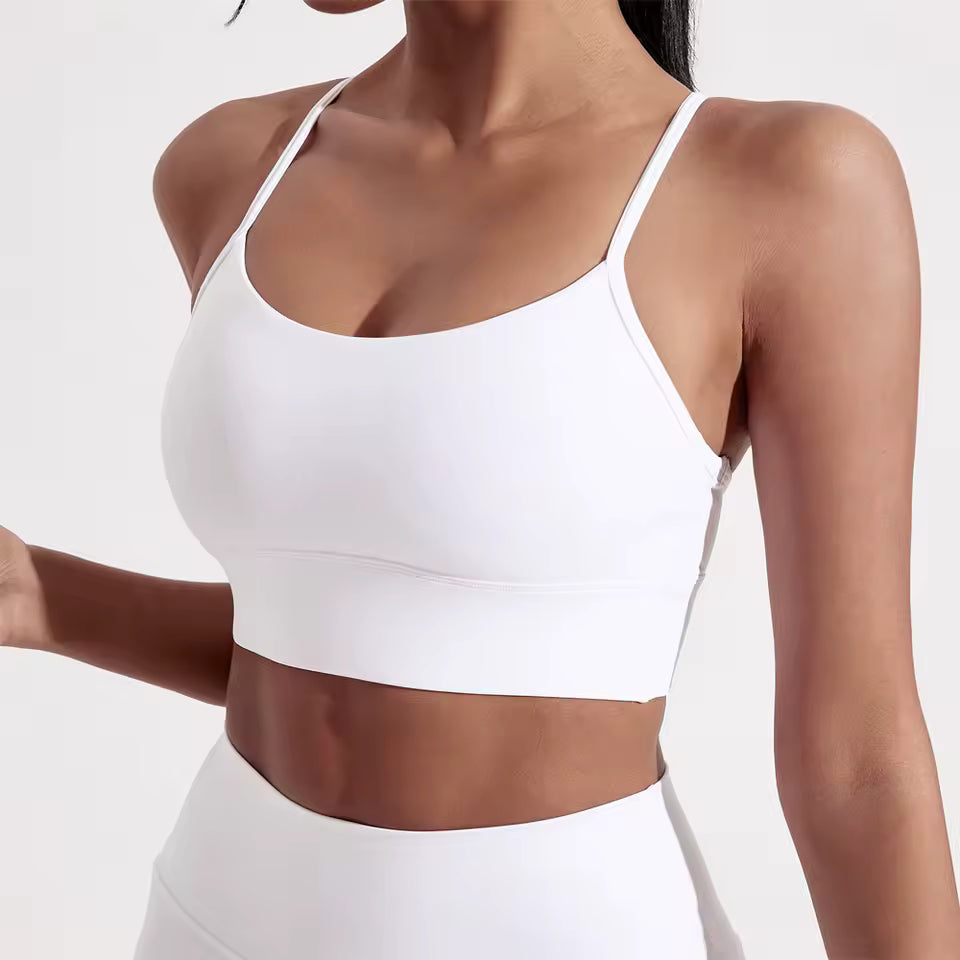 Top desportivo feminino de cor sólida, com formato em Y, macio e ajustado, ideal para treino completo, corrida, ginásio ou ioga, com almofadas removíveis no peito.