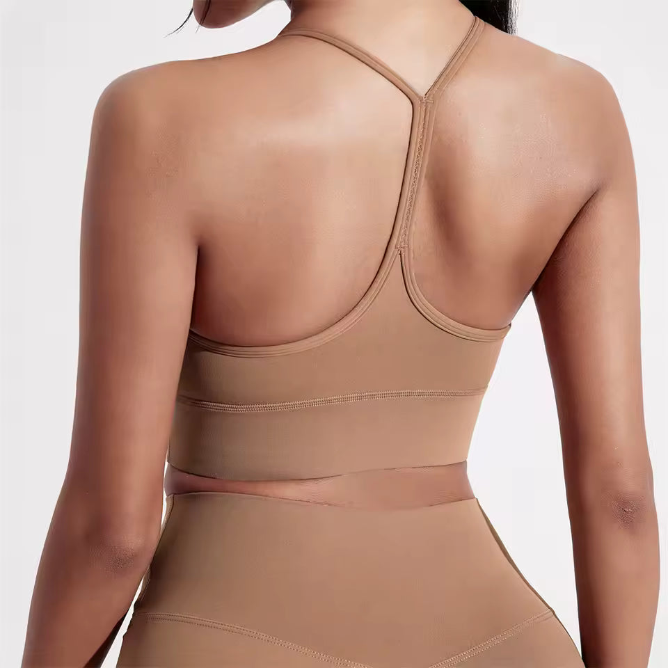 Top desportivo feminino de cor sólida, com formato em Y, macio e ajustado, ideal para treino completo, corrida, ginásio ou ioga, com almofadas removíveis no peito.