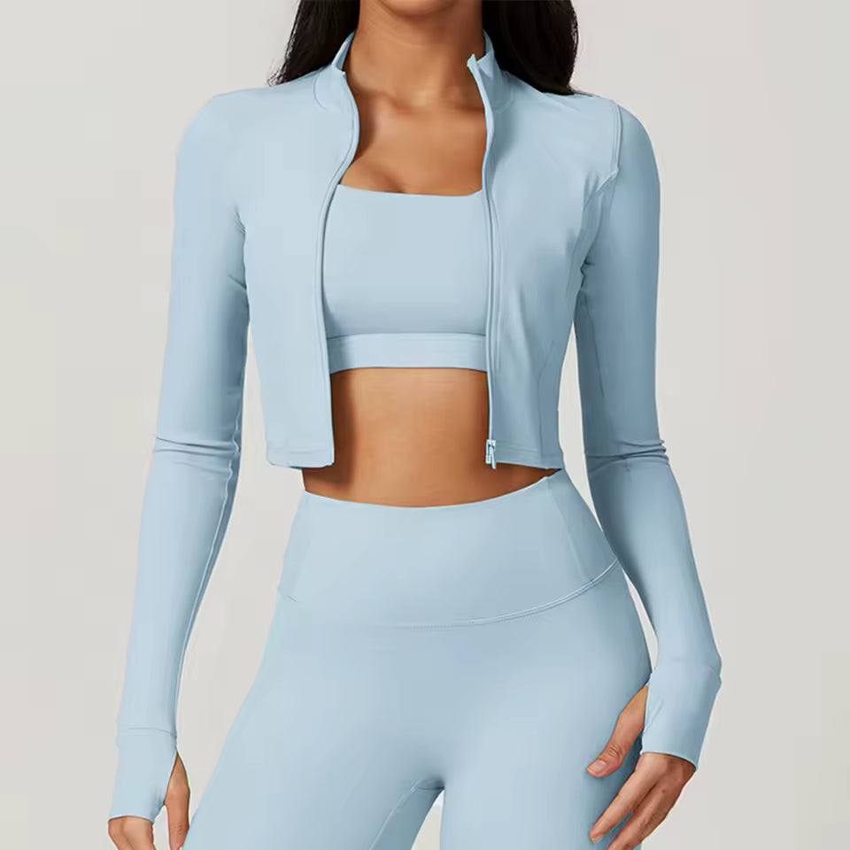 Casaco desportivo feminino de manga comprida, com fecho de zíper, gola alta e tecido de secagem rápida — ideal para yoga, corrida e atividades de fitness ao ar livre.