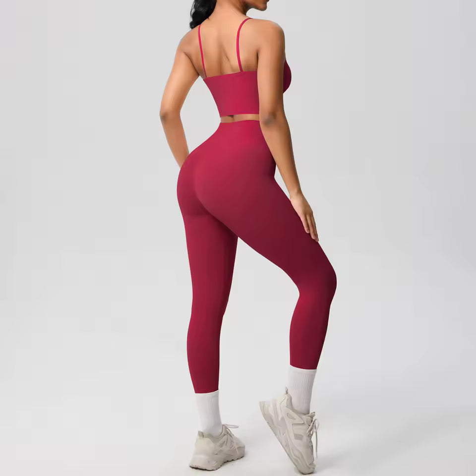 Conjunto desportivo feminino 2 peças — roupa de treino e ioga, com sutiã de suporte e leggings modeladoras para controlo abdominal.