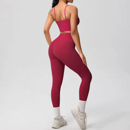 Conjunto desportivo feminino 2 peças — roupa de treino e ioga, com sutiã de suporte e leggings modeladoras para controlo abdominal.