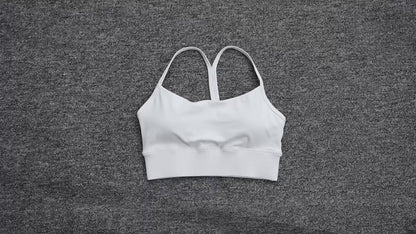 Top desportivo feminino de cor sólida, com formato em Y, macio e ajustado, ideal para treino completo, corrida, ginásio ou ioga, com almofadas removíveis no peito.